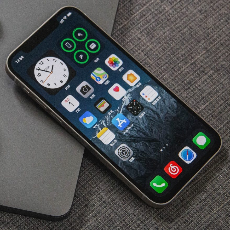 space gray iphone 6 beside apple earpods