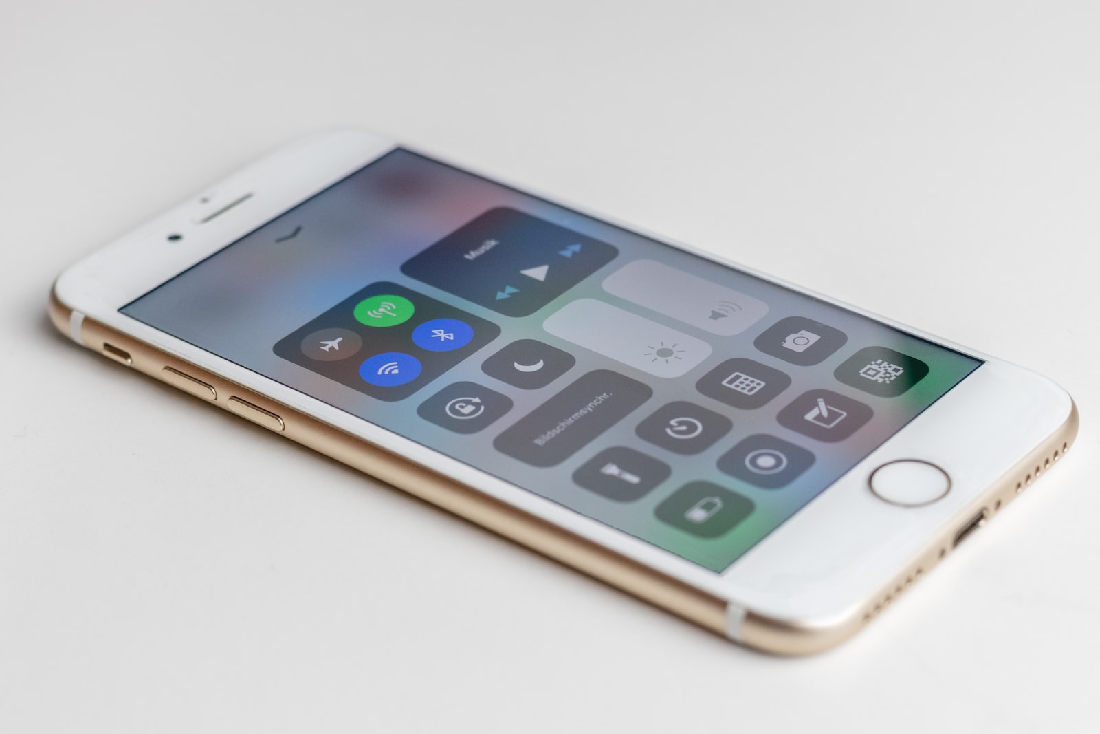 gold iPhone 6s is turned on